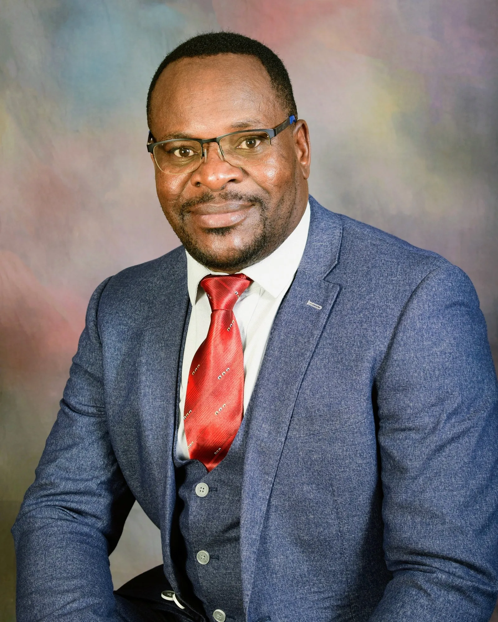 Portrait of Dr. Elkanah Omenge Orang'o